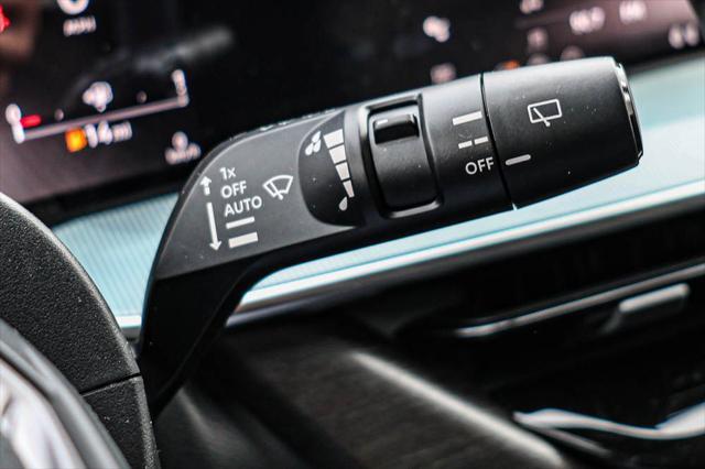 Photo of 2025 Aurora Blue Pearl Metallic/Super Black Nissan Murano