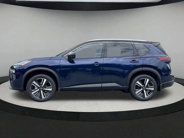 Photo of 2025 Deep Ocean Blue Pearl/Super Black Nissan Rogue
