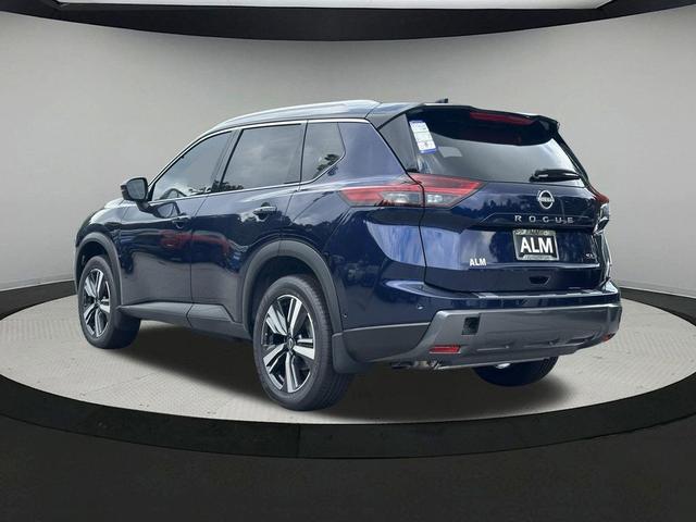 Photo of 2025 Deep Ocean Blue Pearl/Super Black Nissan Rogue