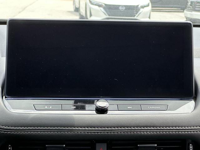 Photo of 2025 Deep Ocean Blue Pearl/Super Black Nissan Rogue