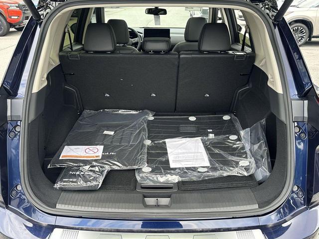 Photo of 2025 Deep Ocean Blue Pearl/Super Black Nissan Rogue