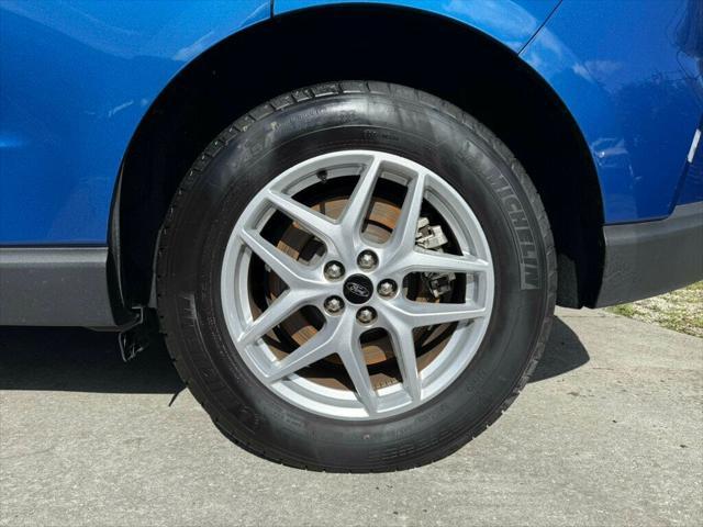 Photo of 2024 Atlas Blue Metallic Ford Edge