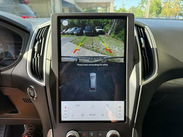 Photo of 2024 Atlas Blue Metallic Ford Edge