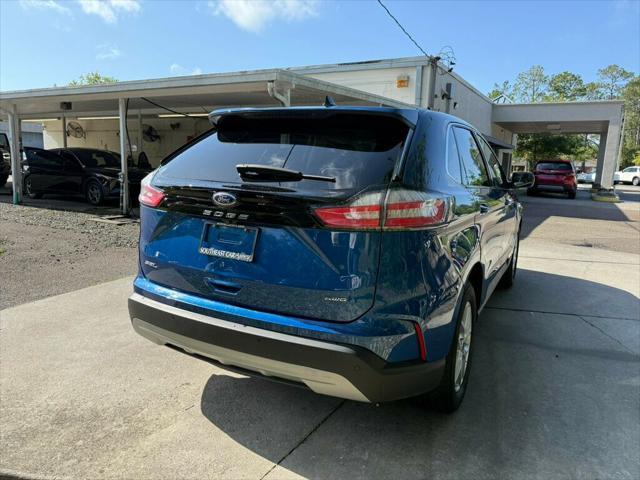 Photo of 2024 Atlas Blue Metallic Ford Edge