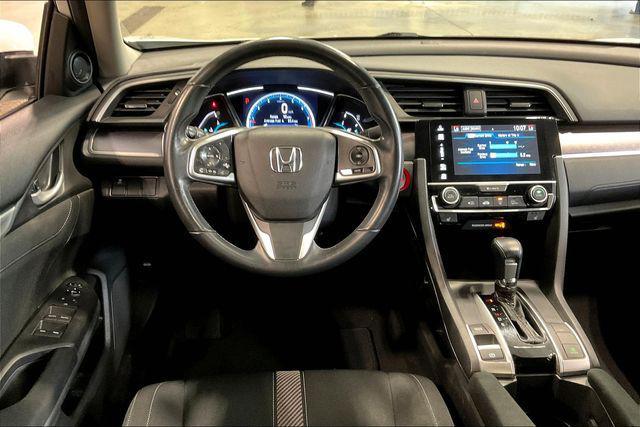 Photo of 2018 White Orchid Pearl Honda Civic