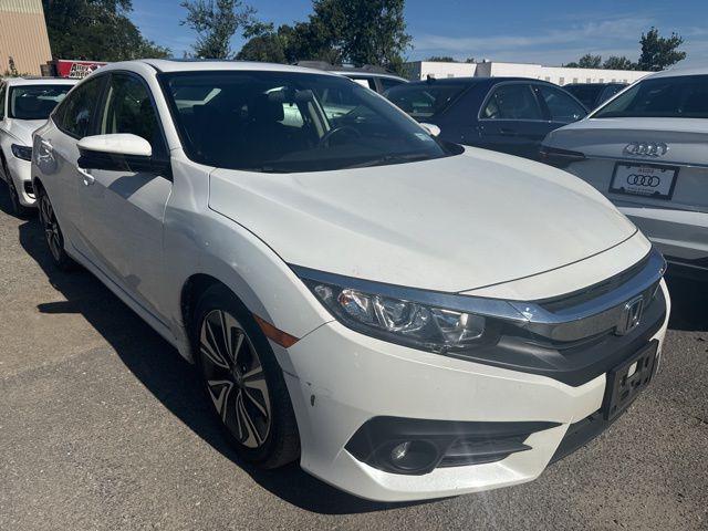 Photo of 2018 White Orchid Pearl Honda Civic