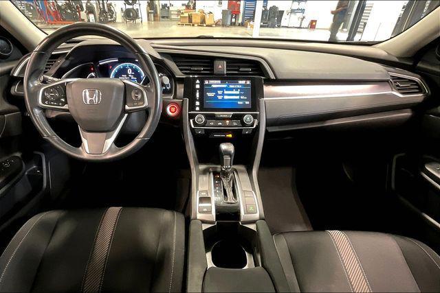Photo of 2018 White Orchid Pearl Honda Civic