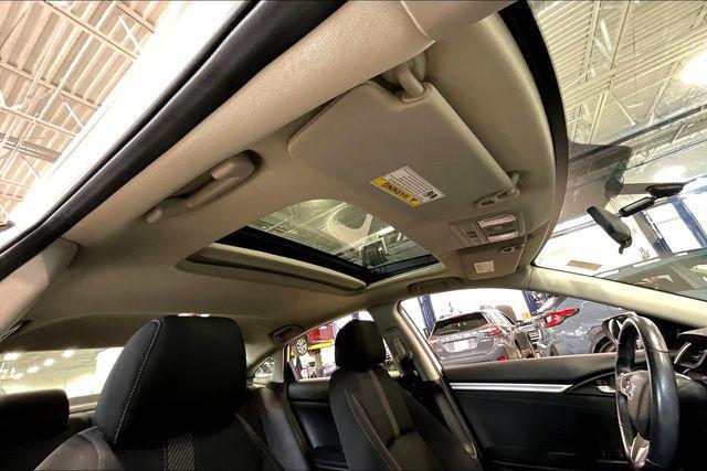 Photo of 2018 White Orchid Pearl Honda Civic