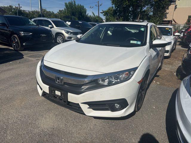 Photo of 2018 White Orchid Pearl Honda Civic