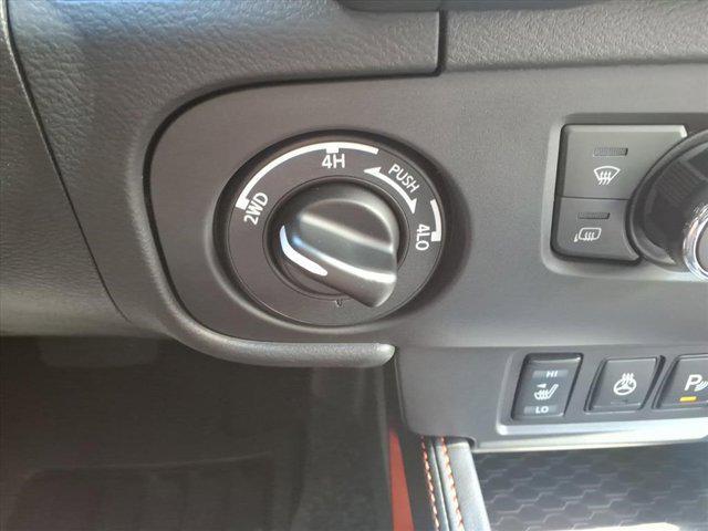 Photo of 2025 Afterburn Orange Nissan Frontier