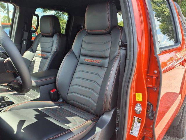 Photo of 2025 Afterburn Orange Nissan Frontier