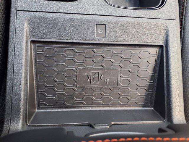 Photo of 2025 Afterburn Orange Nissan Frontier