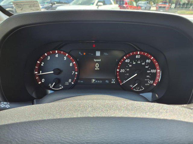 Photo of 2025 Afterburn Orange Nissan Frontier