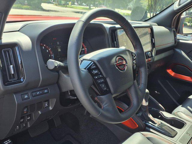 Photo of 2025 Afterburn Orange Nissan Frontier