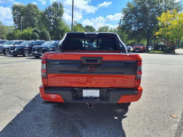 Photo of 2025 Afterburn Orange Nissan Frontier