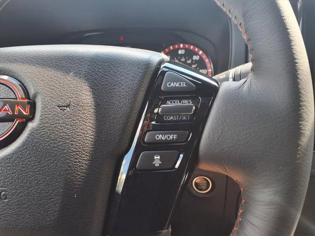Photo of 2025 Afterburn Orange Nissan Frontier