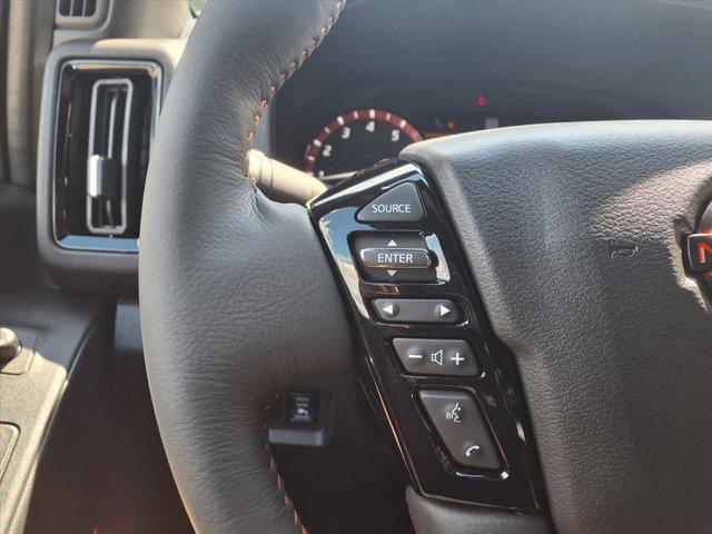 Photo of 2025 Afterburn Orange Nissan Frontier