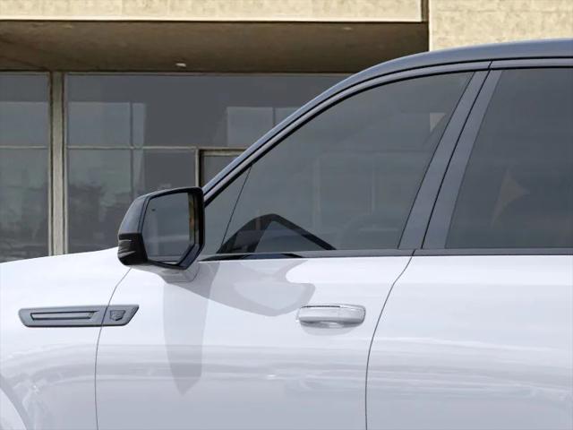 Photo of 2025 Summit White Cadillac Escalade IQ