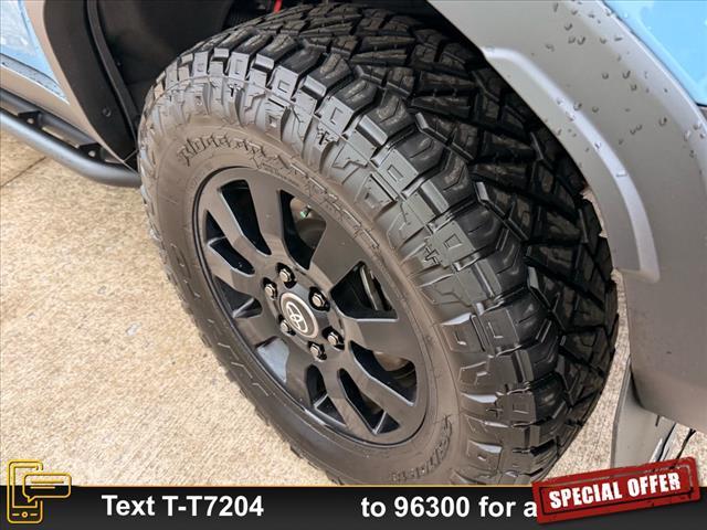 Photo of 2024 Heritage Blue/Gray Scape Toyota Land Cruiser