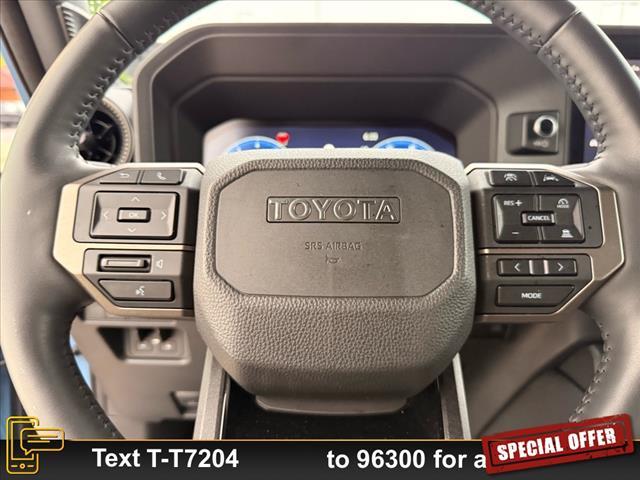 Photo of 2024 Heritage Blue/Gray Scape Toyota Land Cruiser