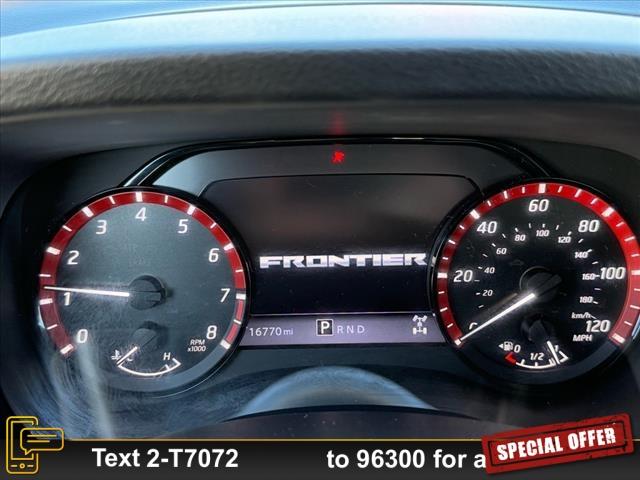 Photo of 2023 Boulder Gray Pearl Nissan Frontier