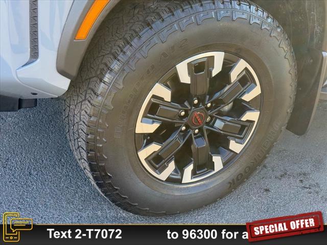 Photo of 2023 Boulder Gray Pearl Nissan Frontier