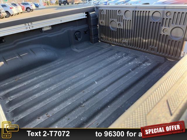 Photo of 2023 Boulder Gray Pearl Nissan Frontier