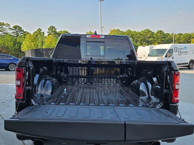 Photo of 2025 Diamond Black Crystal Pearlcoat RAM 1500