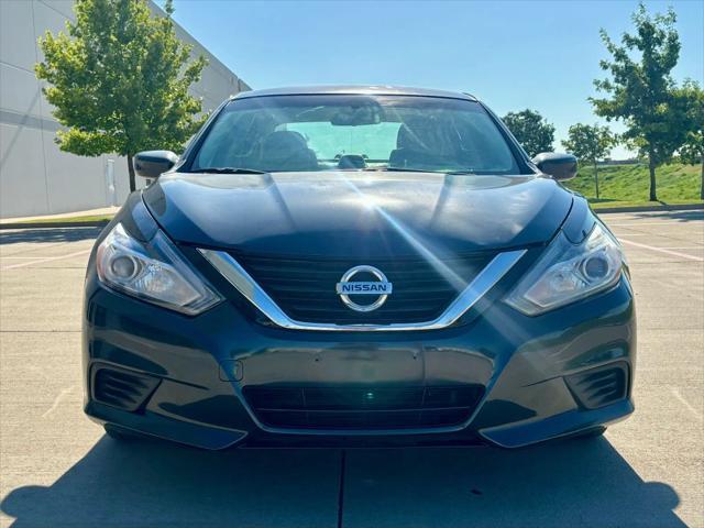 Photo of 2016 Super Black Nissan Altima