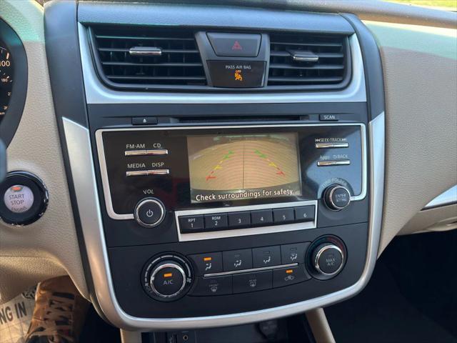 Photo of 2016 Super Black Nissan Altima