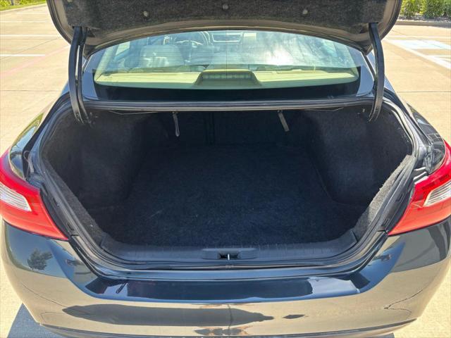 Photo of 2016 Super Black Nissan Altima