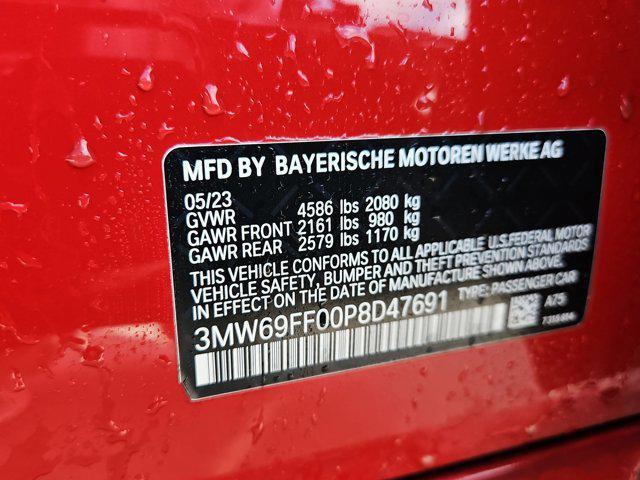 Photo of 2023 Melbourne Red Metallic BMW 330