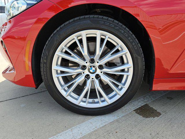 Photo of 2023 Melbourne Red Metallic BMW 330