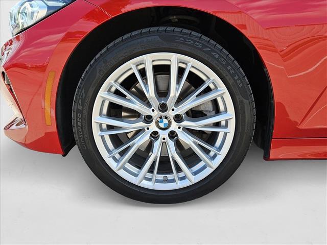 Photo of 2023 Melbourne Red Metallic BMW 330