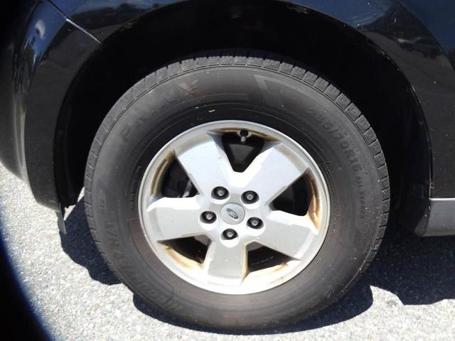 Photo of 2011 Tuxedo Black Metallic Ford Escape