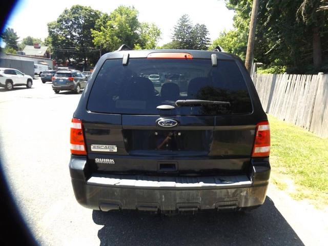 Photo of 2011 Tuxedo Black Metallic Ford Escape