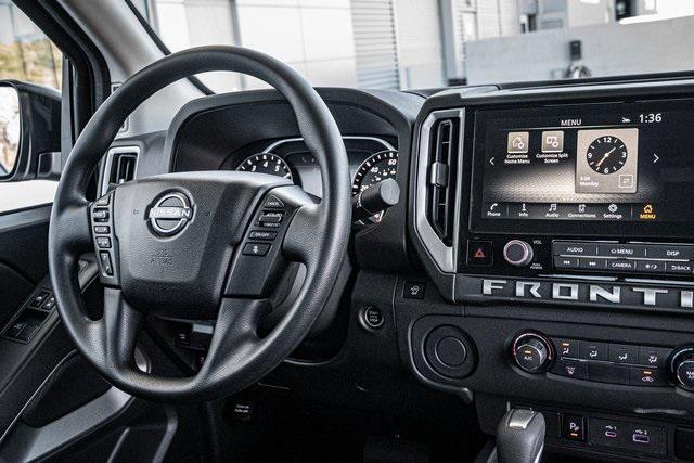 Photo of 2025 Glacier White Nissan Frontier