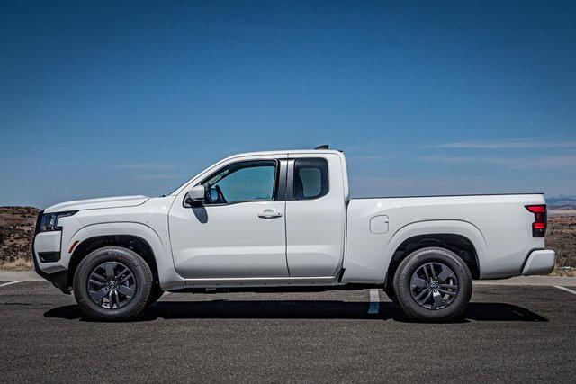 Photo of 2025 Glacier White Nissan Frontier
