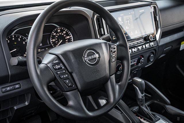 Photo of 2025 Glacier White Nissan Frontier