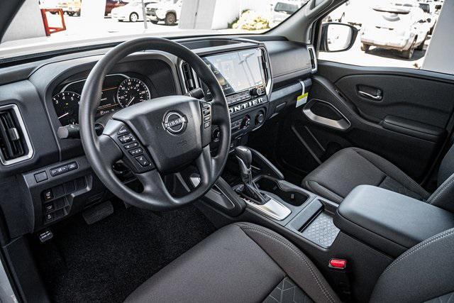 Photo of 2025 Glacier White Nissan Frontier
