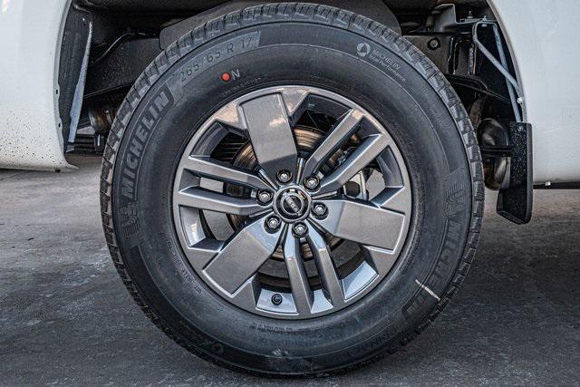 Photo of 2025 Glacier White Nissan Frontier