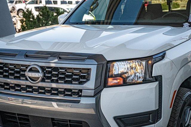 Photo of 2025 Glacier White Nissan Frontier