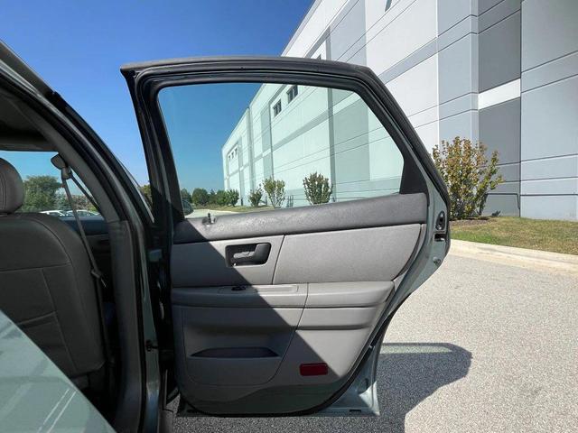 Photo of 2006 Light Tundra Clearcoat Metallic Ford Taurus
