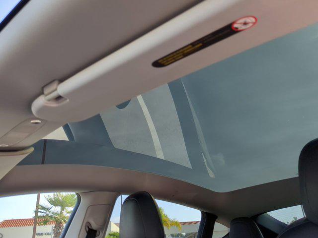 Photo of 2021 Red Multi-Coat Tesla Model Y
