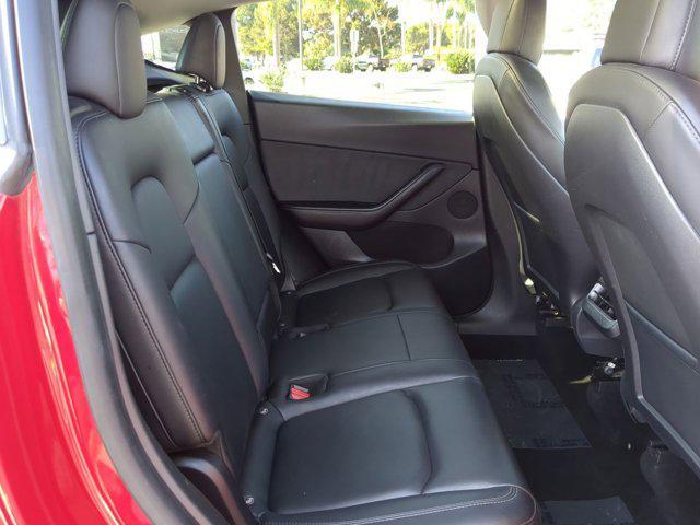 Photo of 2021 Red Multi-Coat Tesla Model Y