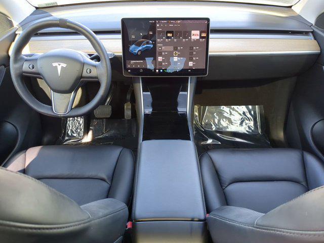 Photo of 2021 Red Multi-Coat Tesla Model Y