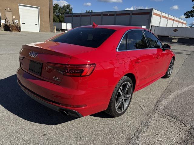 Photo of 2017 Tango Red Metallic Audi A4