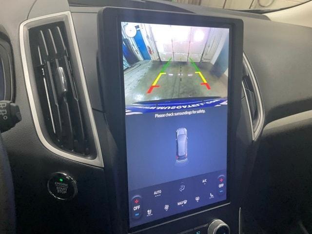 Photo of 2023 Atlas Blue Metallic Ford Edge