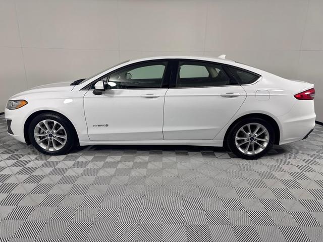 Photo of 2019 White Ford Fusion Hybrid