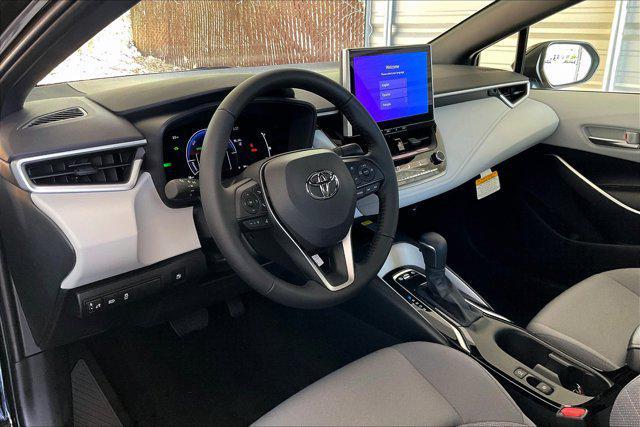 Photo of 2025 Midnight Black Metallic Toyota Corolla Hybrid